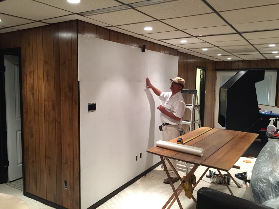 can you skim coat over wood paneling