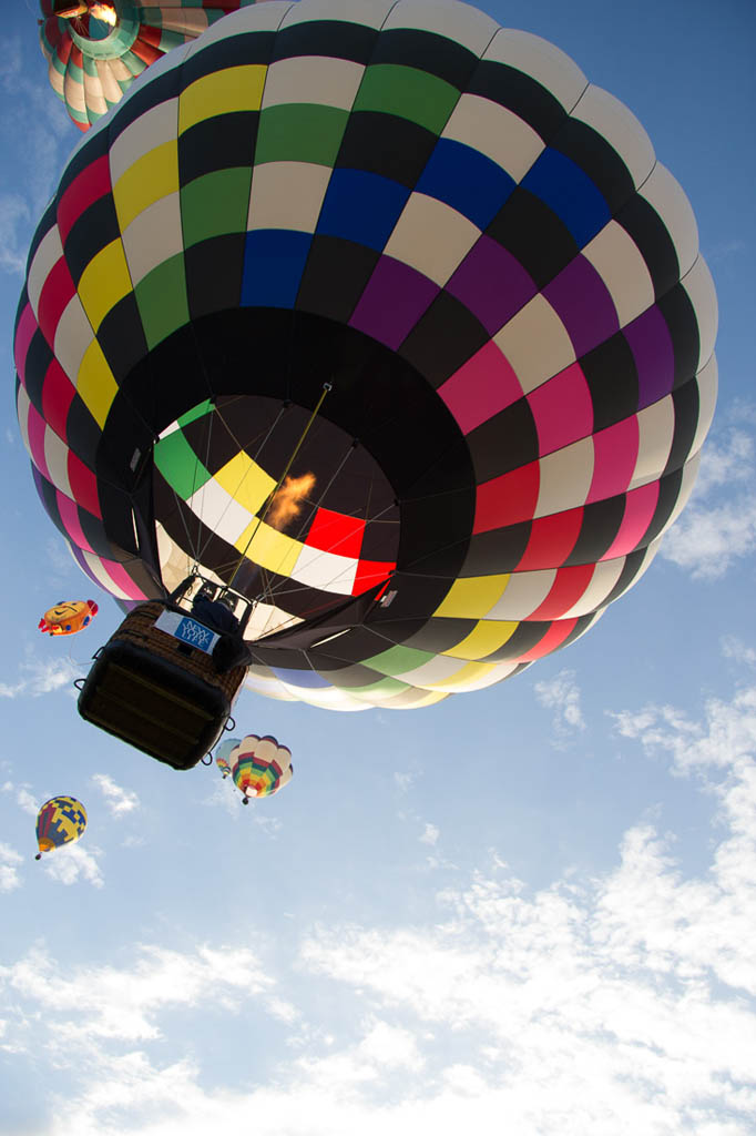Looking upward at balloons at the Hot Air Balloon Festival in Albuquerque