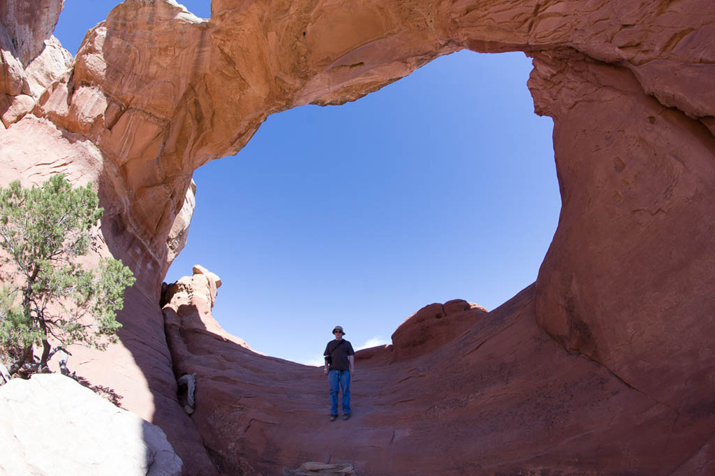 Ken standing under Broken Arch