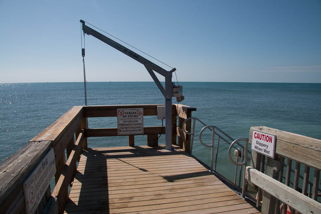 Steps to get into water at beach at hotel