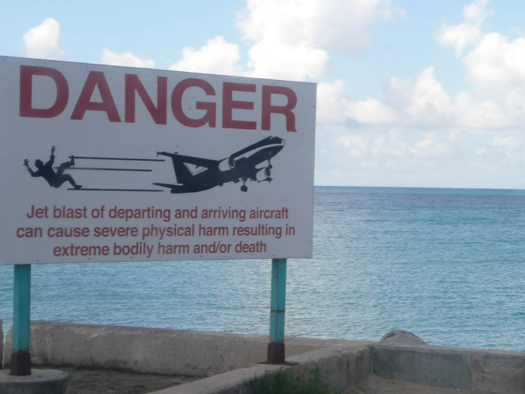 Danger signs at Maho Beach in St. Maarten