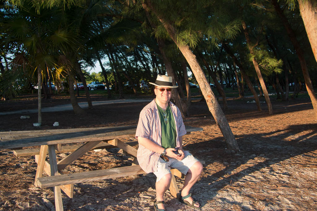 Ken sitting at picnic table at Fort Zachary Taylor