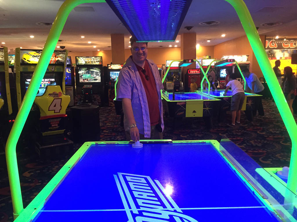 Playing air hockey at Circus Circus