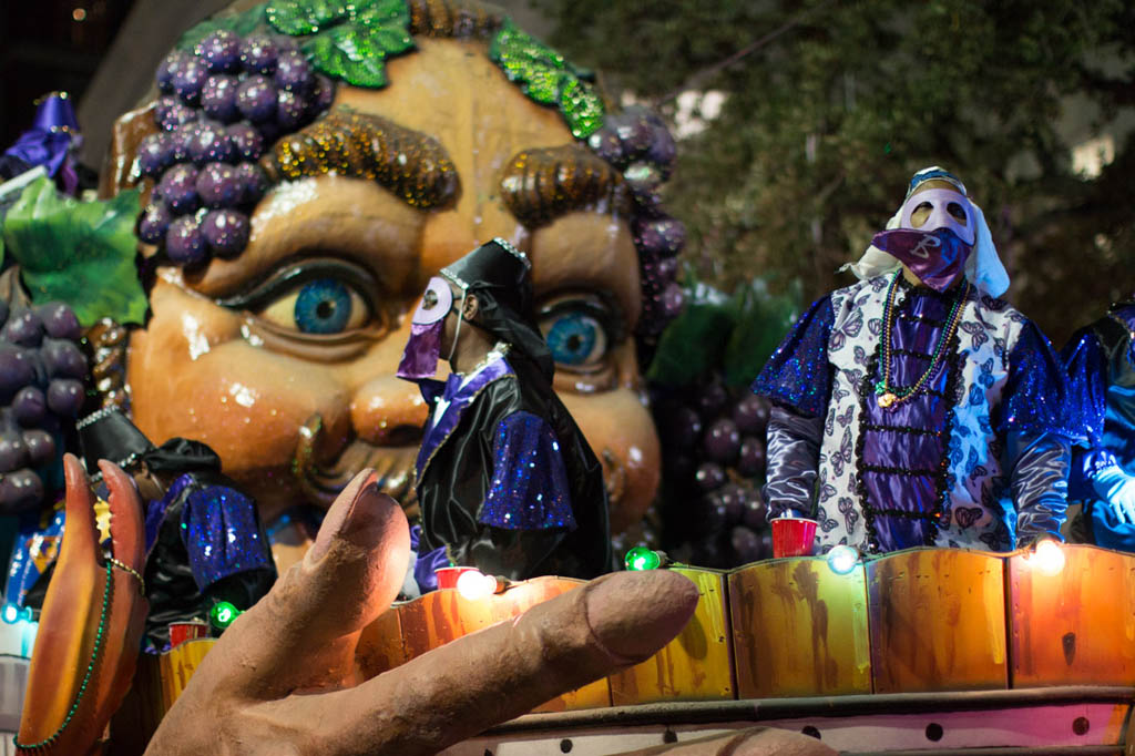 Krewe of Bacchus from Lafayette Hotel grandstands during Mardi Gras