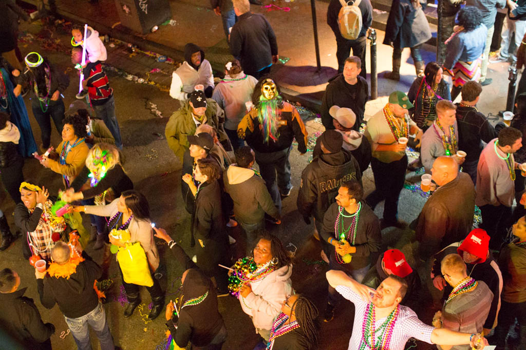 People catching beads during Mardi Gras