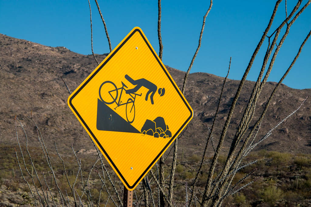 Falling off bicycle warning sign